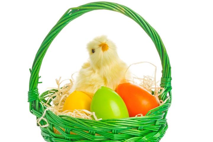 basket with easter eggs and...