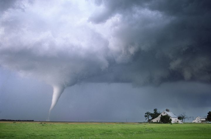 A strong tornado approaches a farmstead in Nebraska on June 9th, 2003. This storm resulted in the destruction of several farms similar to this one.