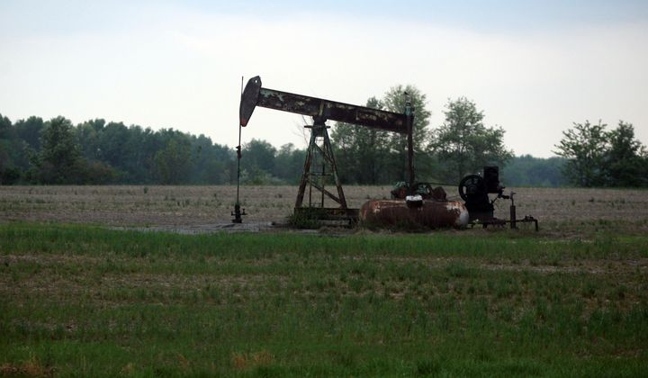 A pump jack works on Wednesday, April 4, 2012, in Cisne, Illinois, as nearby areas are marked for the start of fracking operations. (Antonio Perez/Chicago Tribune/MCT via Getty Images)