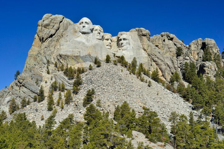 The famous Mount Rushmore National Monument in South Dakota on a sunny day. Nice travel background.
