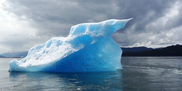 Iceberg formed from highly compressed glacial ice has a surreal blue color - image has no post processing.