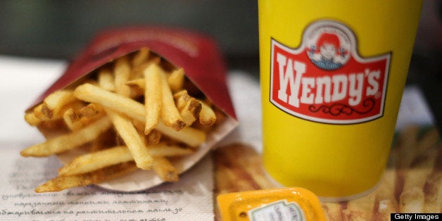 A customer's meal of French fries and a soft drink sit on a tray inside a Wendy's fast food restaurant in Moscow, Russia, on