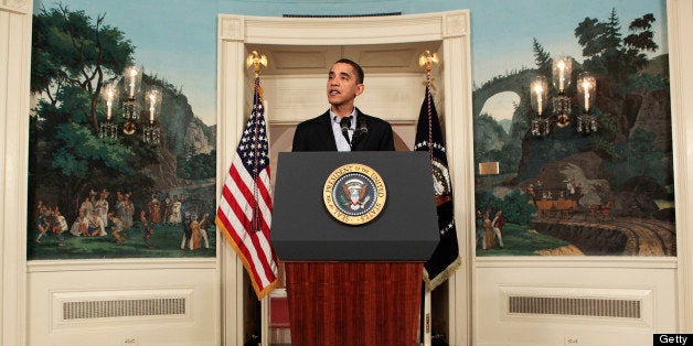 U.S. President Barack Obama makes a statement in the Diplomatic Reception Room of the White House in Washington, D.C., U.S., on Saturday, Dec. 19, 2009. Obama called a climate change agreement with China and about 25 other nations an unprecedented move to slow global warming. Environmental groups and at least five developing nations called it a failure. Photographer: Aude Guerrucci/Pool via Bloomberg