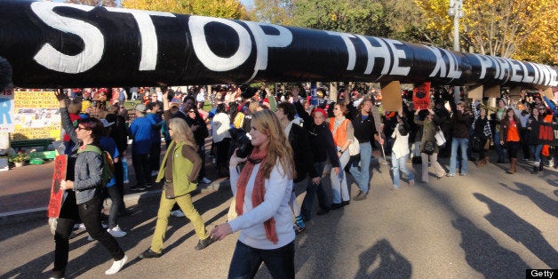 Thousands of protesters encircled the White House in Washington, D.C., Sunday, November 6, 2011, to demonstrate against the p