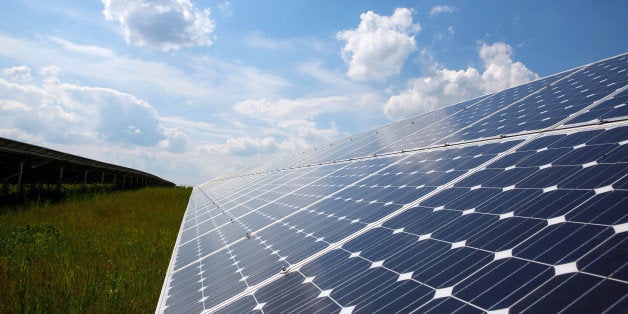 Solar panels produced by Solarworld AG are seen located in a field near to the company's plant in Freiberg, Germany, on Wednesday, June 12, 2013. Solarworld AG is among companies battling competition mainly from China that pushed solar panel prices down about 20 percent last year after slumping by half in 2011. Photographer: Krisztian Bocsi/Bloomberg via Getty Images