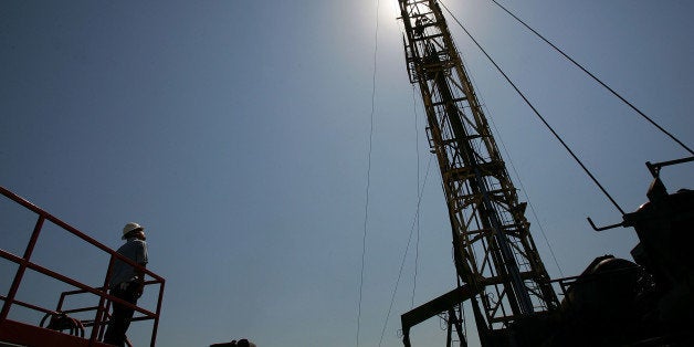 TAFT, CA - JULY 22: Workers with Diamond Well Service, Inc. drill a 3,100-foot deep oil well on July 22, 2008 near Taft, California. Hemmed in by the richest oil fields in California, the oil town of 6,700 with a stagnant economy and little room to expand has hatched an ambitious plan to annex vast expanses of land reaching eastward to Interstate 5, 18 miles away, and taking over various poor unincorporated communities to triple its population to around 20,000. With the price as light sweet crude at record high prices, Chevron and other companies are scrambling to drill new wells and reopen old wells once considered unprofitable. The renewed profits for oil men of Kern County, where more than 75 percent of all the oil produced in California flows, do not directly translate increased revenue for Taft. The Taft town council wants to cash in on the new oil boom with increased tax revenues from a NASCAR track and future developments near the freeway. In an earlier oil boom era, Taft was the site of the 1910 Lakeside Gusher, the biggest oil gusher ever seen in the US, which sent 100,000 barrels a day into a lake of crude. (Photo by David McNew/Getty Images)