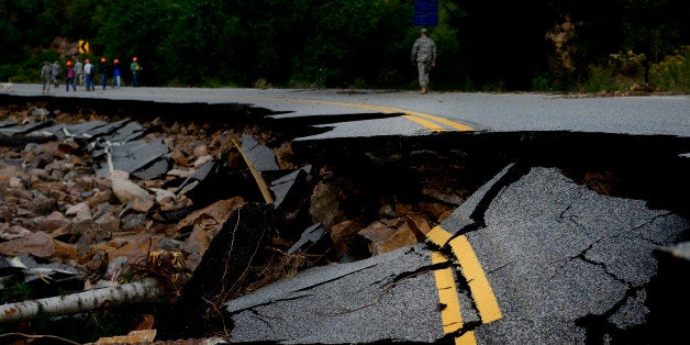 LYONS, CO - SEPTEMBER 22: Colorado National Guard soldiers lead a group of CDOT and state employees during a tour to look at the damage caused by recent flooding in the area on U.S. Highway 36 between Lyons and Pinewood Springs. Pavement is missing in many section of the road that connects Lyons to Estes Park. (Photo by AAron Ontiveroz/The Denver Post via Getty Images)