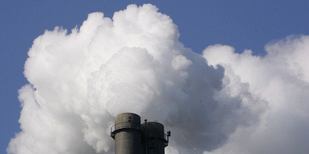 BERLIN - MARCH 23: Exhaust plumes from the main chimneys of the black coal-fired power plant Heizkraftwerk Reuter West March 23, 2007 in Berlin, Germany. Germany is still heavily dependant on coal for much of its electric power production, though the country is pushing an aggressive policy of CO2 emissions reductions. (Photo by Sean Gallup/Getty Images)