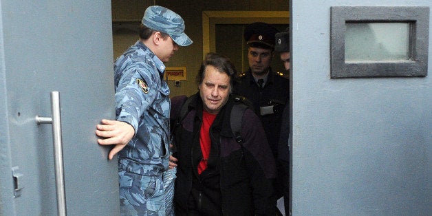 The captain of the Arctic Sunrise Dutch-flagged Greenpeace protest ship, Peter Willcox from USA, leaves the SIZO 1 detention centre onin Saint Petersburg, on November 22, 2013, after being released on bail. Russia had held 30 crew members of the Arctic Sunrise for over two months after activists in September scaled an oil rig in the Barents Sea owned by energy giant Gazprom. Hearings on whether to detain the so called of the 'Arctic 30' for a further three months of pre-trial detention were set to continue this week. AFP PHOTO / OLGA MALTSEVA (Photo credit should read OLGA MALTSEVA/AFP/Getty Images)