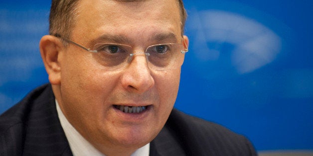 French professor Gilles-Eric Seralini gives a press conference on November 28, 2013 at EU headquarters in Brussels to denounc