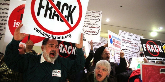 ALBANY, NY - JANUARY 08: Anti-fracking protesters gather outside of the auditorium before New York Gov. Andrew Cuomo gives his fourth State of the State address on January 8, 2014 in Albany, New York. Fracking for natural gas has become a contentious issue in New York State and the governor has yet to decide on whether to allow the practice or to ban it. Cuomo's speech is expected to focus on the state's economic recovery as well as a proposal for limited legalization of medical marijuana. (Photo by Spencer Platt/Getty Images)