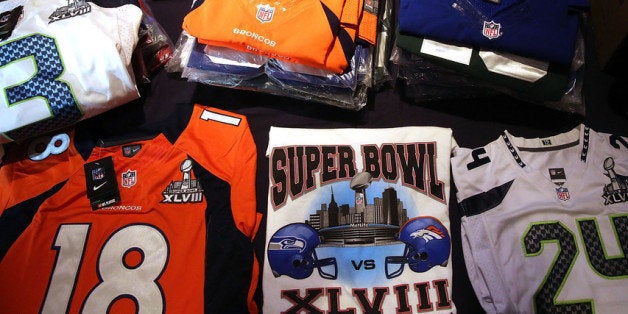 NEW YORK, NY - JANUARY 30: Confiscated counterfeit Super Bowl XLVIII merchandise is viewed at a news conference on the latest seizure of the merchandise leading up to the Super Bowl on January 30, 2014 in New York City. Officials from the National Football League, U.S. Immigration and Customs Enforcement and U.S. Customs and Border Protection displayed recently confiscated items while also showing phony websites that have been set-up to sell Super Bowl XLVIII merchandise. Counterfeit sports merchandise, much of which originates in China, is a multi million dollar industry. (Photo by Spencer Platt/Getty Images)