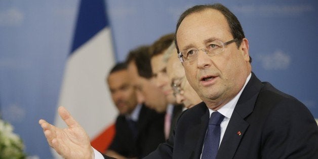 French President Francois Hollande speaks during a bilateral meeting with US President Barack Obama at the G-20 Summit, Frid