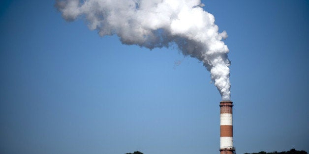 NEW EAGLE, PA - SEPTEMBER 24: A plume of exhaust extends from the Mitchell Power Station, a coal-fired power plant built alon