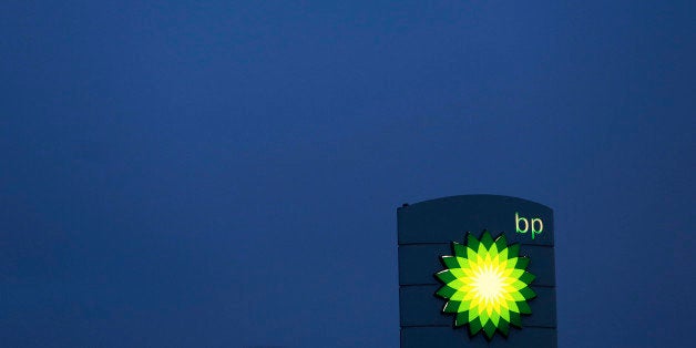 An illuminated sign stands on the forecourt of a BP gas station, operated by BP Plc, in Upminster, U.K., on Thursday, Feb. 28, 2013. BP Plc's push to maximize profits and cut costs at the Macondo well was a 'root cause' of the explosion that led to the 2010 Gulf of Mexico oil spill, a safety expert who studied the disaster said. Photographer: Chris Ratcliffe/Bloomberg via Getty Images