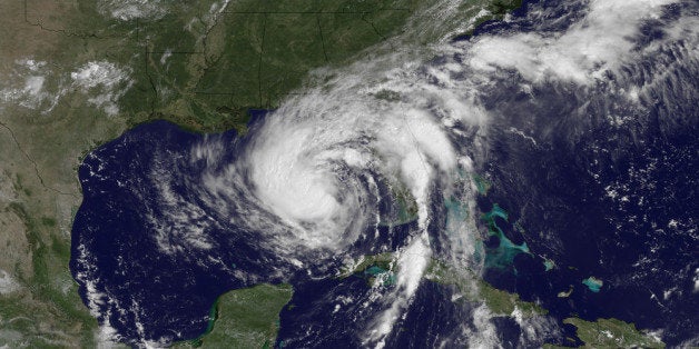 AT SEA - AUGUST 27: In this handout satellite image provided by National Oceanic and Atmospheric Administration (NOAA), Tropical Storm Isaac moves toward the Florida coast on August 27, 2012 in the Atlantic Ocean. According to reports, Isaac, still rated as a tropical storm, is expected to strengthen into at least a Category 1 hurricane before making landfall August 29, somewhere over an approximately 300 mile portion of the Gulf Coast, which includes New Orleans, on the seven-year anniversary of Hurricane Katrina. (Photo by NOAA via Getty Images)