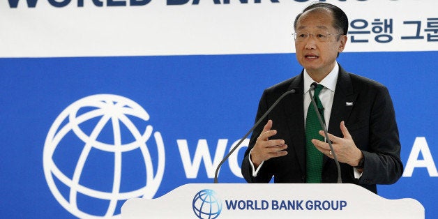 Jim Yong Kim, president of the World Bank Group, gestures as he speaks during the opening of the World Bank Group office in the Songdo district of Incheon, South Korea, on Wednesday, Dec. 4, 2013. South Korea will 'actively' support the World Bank's infrastructure fund to help developing economies, Finance Minister Hyun Oh Seok told reporters in Songdo, west of Seoul today. Photographer: SeongJoon Cho/Bloomberg via Getty Images 