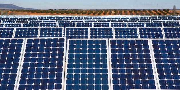 Solar panels stand at a solar power plant operated by Ingeneieria y Electricidad Rodriguez SL in Villanueva de los Infantes, Spain, on Monday, March, 10, 2014. Iberdrola SA estimates reduced support by the Spanish government will cost renewable power generators, such as itself and Acciona, 3.96 billion euros ($5.41 billion), with wind and biomass the most affected. Photographer: Angel Navarrete/Bloomberg via Getty Images