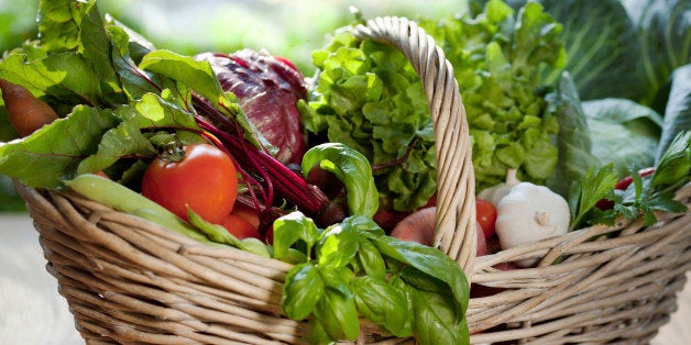 Wicker basket with fresh vegetables.