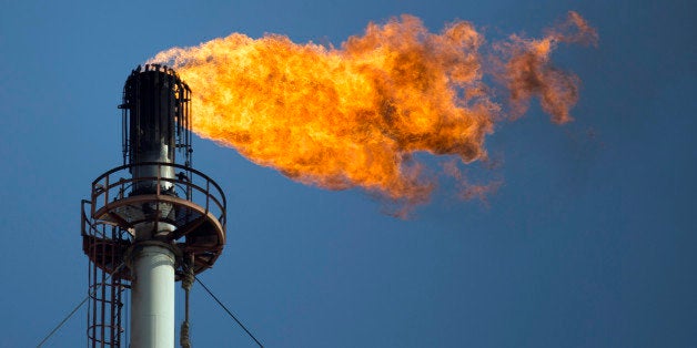 Flames shoot out of one of the flare stacks at the Petroleos Mexicanos (Pemex) Miguel Hidalgo Refinery in Tula de Allende, Mexico, on Thursday, March 6, 2014. The Pemex board of directors approved a $3.4 billion plan last month to improve fuel quality at refineries. Photographer: Susana Gonzalez/Bloomberg via Getty Images