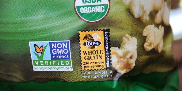 A label on a bag of popcorn indicates it is a non-GMO food product, in Los Angeles, California, October 19, 2012. California could become the first US state to enforce labeling of genetically modified foodstuffs also know as GMO's, in a vote next month pitting agro-chemical manufacturing giants against die-hard opponents of so-called 'frankenfoods.' The state will vote on November 6 ? the same day as the White House election ? on the ballot initiative, which backers claim will let consumers know exactly what they are eating, but critics say will pander to unjustified fears about genetic engineering. AFP PHOTO / ROBYN BECK (Photo credit should read ROBYN BECK/AFP/Getty Images)