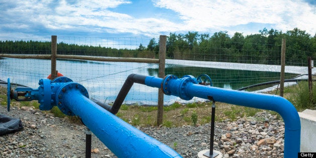 Containment pond for a producing Marcellus shale well site. This pond is used to evaporate the contaminated water that is constantly carried to the surface by the natural gas.