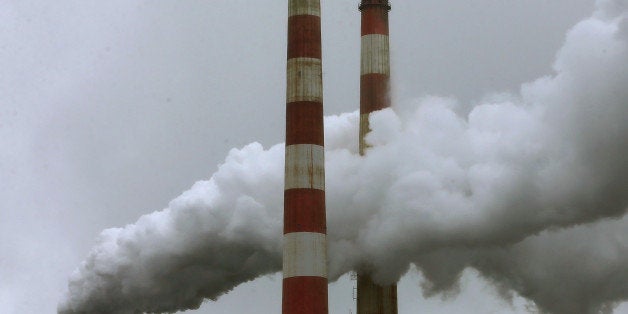 NEWBURG, MD - MAY 29: Emissions spew out of a large stack at the coal fired Morgantown Generating Station, on May 29, 2014 i