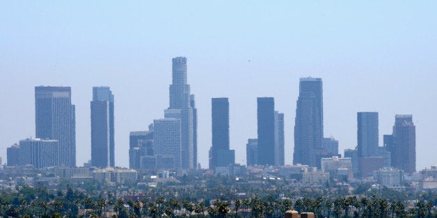 LOS ANGELES, CA - JUNE 28: Downtown high rises are slightly distorted from heat waves during a major heat wave in Southern California on June 28, 2013 in Los Angeles, California. Temperatures are expected to be in the triple digits in most areas of Southern California. According to the national Weather Service, the heat wave is expected to linger into early next week prompting heat advisories and opening of cooling centers. (Photo by Kevork Djansezian/Getty Images)