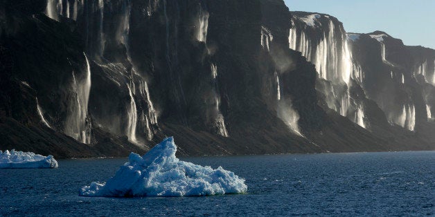 ANTARCTICA - 2006/01/17: Antarctica, Antarctic Peninsula, Vega Island, Waterfalls Backlit, Water From Melting Glaciers (global Warming), Iceberg. (Photo by Wolfgang Kaehler/LightRocket via Getty Images)