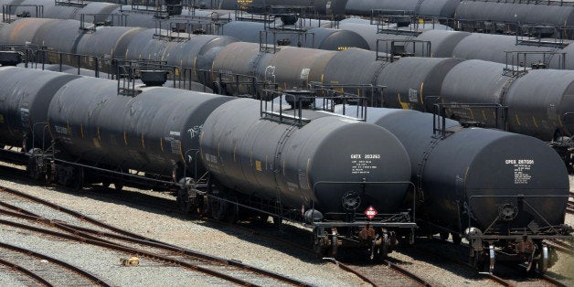 RICHMOND, CA - JULY 14: Railroad tanker cars sit outside of the Chevron refinery July 14, 2008 in Richmond, California. As gasoline prices continue to climb to a national average of $4.11 per gallon of regular unleaded, U.S. President George Bush announced today that he has lifted the executive ban on offshore oil drilling that his father, former U.S. President George H.W. Bush imposed during his term in office. (Photo by Justin Sullivan/Getty Images)