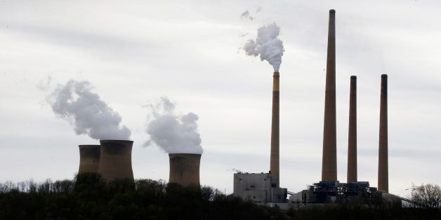 This photo taken May 5, 2014 shows the stacks of the Homer City Generating Station in Homer City, Pa. Three years ago, the operators of one of the nationâs dirtiest coal-fired power plants warned of âimmediate and devastatingâ consequences from the Obama administrationâs push to clean up pollution from coal. Faced with cutting sulfur dioxide pollution blowing into downwind states by 80 percent in less than a year, lawyers for EME Homer City Generation L.P. sued the Environmental Protection Agency to block the rule, saying it would cause a painful spike in electricity bills and grave harm to power producers like itself. (AP Photo/Keith Srakocic)