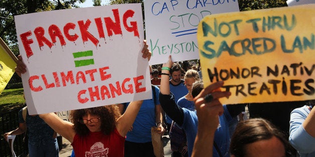 NEW YORK, NY - SEPTEMBER 21: Anti-fracking and Keystone XL pipeline activists demonstrate in lower Manhattan on September 21