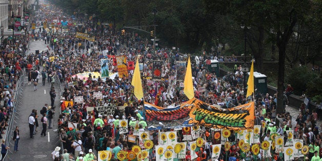 IMAGE DISTRIBUTED FOR AVAAZ - More than 100,000 people march through midtown Manhattan on Sunday, Sept. 21, 2014 as part of the People's Climate March, a worldwide mobilization calling on world leaders meeting at the UN to commit to urgent action on climate change and 100% clean energy in New York. (John Minchillo/AP Images for AVAAZ)