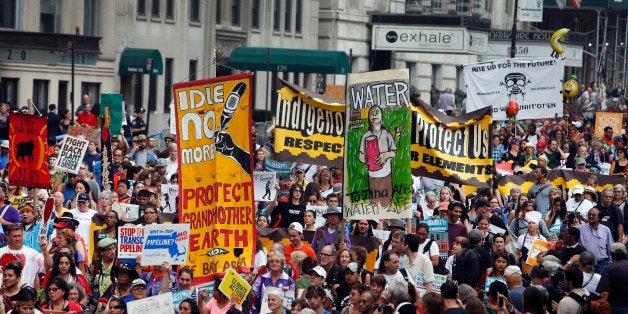 Demonstrators fill Central Park South during the People's Climate March Sunday, Sept. 21, 2014 in New York. The march, along with similar gatherings scheduled in other cities worldwide, comes two days before the United Nations Climate Summit, where more than 120 world leaders will convene for a meeting aimed at galvanizing political will for a new global climate treaty by the end of 2015. (AP Photo/Jason DeCrow)