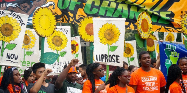 NEW YORK, NY - SEPTEMBER 21: Nearly a hundred thousand of people, wearing different costumes, attend the People's Climate March to take attention to the climate change in New York, United States on September 21, 2014. (Photo by Cem Ozdel/Anadolu Agency/Getty Images)