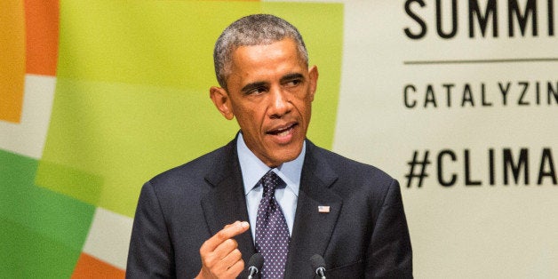 NEW YORK, NY - SEPTEMBER 23: U.S. President Barack Obama speaks at the United Nations Climate Summit on September 23, 2014 in New York City. The summit, which is meeting one day before the UN General Assembly begins, is bringing together world leaders, scientists and activists looking to curb climate change. (Photo by Andrew Burton/Getty Images)