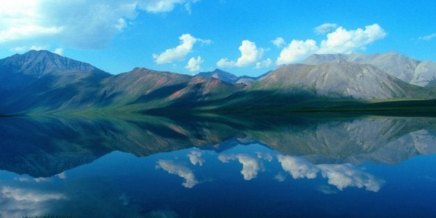 Alaska, Arctic National Wildlife Refuge, ANWR, Reflections of Brooks Range Mountains in Schrader Lake. (Photo by: Universal I