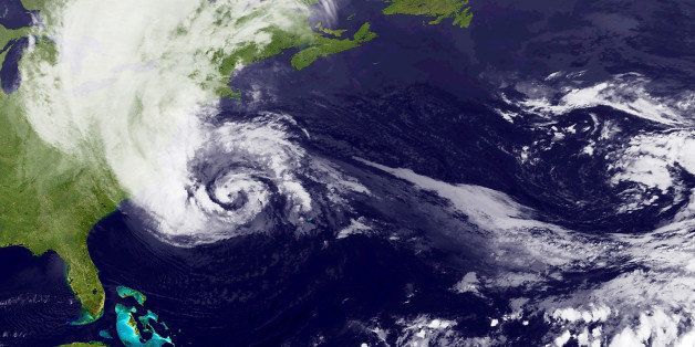 AT SEA - OCTOBER 28: In this handout satellite image provided by National Oceanic and Atmospheric Administration (NOAA), Hurricane Sandy, pictured at 00:15 UTC, churns off the east coast on October 28, 2012 in the Atlantic Ocean. Sandy which has already claimed over 50 lives in the Caribbean is predicted to bring heavy winds and floodwaters to the mid-atlantic region. (Photo by NASA via Getty Images)