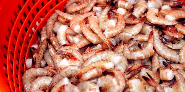 A basket of shrimp waits to be processed at Golden Gulf Coast Packing Company in Biloxi, Mississippi, January 11, 2013. (Tim Isbell/Biloxi Sun Herald/MCT via Getty Images)