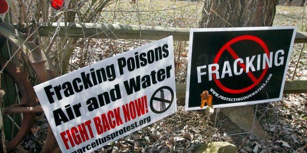 FILE - In this Feb. 23, 2012 file photo, signs opposing the hydraulic fracturing process of drilling for gas, or "fracking" are posted in Evans City, Pa. The Obama administration said Friday it will for the first time require companies drilling for oil and natural gas on public and Indian lands to publicly disclose chemicals used in hydraulic fracturing operations. The proposed "fracking" rules also set standards for proper construction of wells and wastewater disposal. (AP Photo/Keith Srakocic, File)