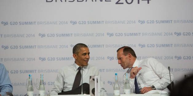 BRISBANE, AUSTRALIA - NOVEMBER 15: In this handout photo provided by the G20 Australia, Australia's Prime Minister Tony Abbott (R) speaks to United States' President Barack Obama at a dinner for G20 leaders at the Queensland Art Gallery on November 15, 2014 in Brisbane, Australia. World leaders have gathered in Brisbane for the annual G20 Summit and are expected to discuss economic growth, free trade and climate change as well as pressing issues including the situation in Ukraine and the Ebola crisis. (Photo by Andrew Taylor/G20 Australia via Getty Images)