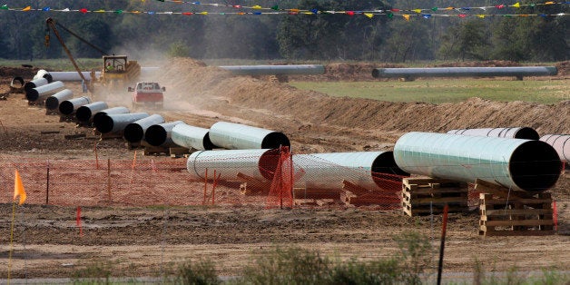 File - In this Oct. 4, 2012 file photo, large sections of pipe are shown in Sumner, Texas. Republicans are counting on a swift vote in early 2015 on building the Keystone XL pipeline to carry oil from Canada to the U.S. Gulf Coast now that Republicans clearly have the numbers in the Senate. (AP Photo/Tony Gutierrez, File)