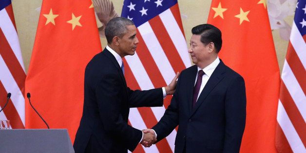 BEIJING, CHINA - NOVEMBER 12: U.S. President Barack Obama (L) shakes hands with Chinese President Xi Jinping (R) after a joint press conference at the Great Hall of People on November 12, 2014 in Beijing, China. U.S. President Barack Obama pays a state visit to China after attending the 22nd Asia-Pacific Economic Cooperation (APEC) Economic Leaders' Meeting. (Photo by Feng Li/Getty Images)