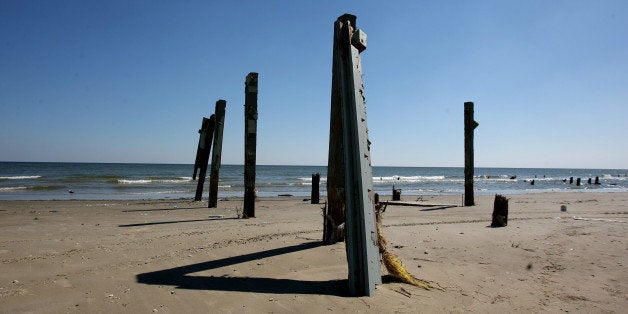 Support poles are all that is left of homes destroyed by Hurricane Ike line the west end of Jamaica Beach on Galveston Island