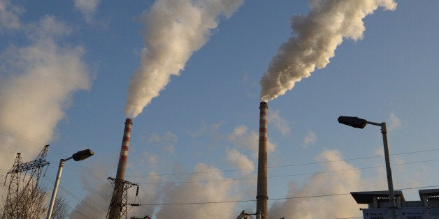 Steam rises from chimneys at the Junliangcheng power station in Tianjin, China, on Wednesday, March 13, 2013. China's money-market rate rose to a one-week high after central bank Governor Zhou Xiaochuan said yesterday the nation should be on 'high alert' over inflation. Photographer: Tomohiro Ohsumi/Bloomberg via Getty Images