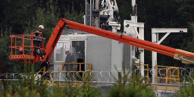 BALCOMBE, UNITED KINGDOM - AUGUST 17: A general view of the drill site operated by Cuadrilla Resources Ltd on August 17, 2013 in Balcombe, West Sussex. Protesters continue to gather outside the Balcombe plant in West Sussex in opposition to the controversial method of extracting energy out of the ground called 'fracking'. (Photo by Dan Kitwood/Getty Images)