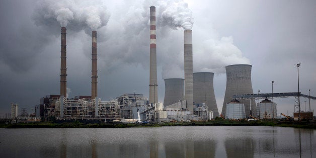 Plumes of water vapor emit from the Tennessee Valley Authority Paradise Fossil Plant in Paradise, Kentucky, U.S., on Tuesday, Aug. 13, 2013. The plant generates and delivers 14 billion kilowatt-hours of coal-fired electricity per year to Western Kentucky and Nashville, Tennessee. Photographer: Luke Sharrett/Bloomberg via Getty Images