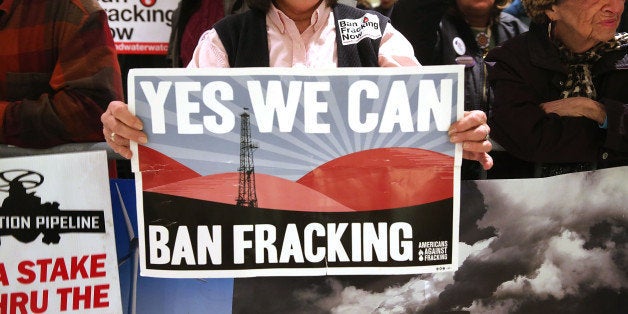 ALBANY, NY - JANUARY 08: Anti-fracking protesters gather outside of the auditorium before New York Gov. Andrew Cuomo gives his fourth State of the State address on January 8, 2014 in Albany, New York. Fracking for natural gas has become a contentious issue in New York State and the governor has yet to decide on whether to allow the practice or to ban it. Cuomo's speech is expected to focus on the state's economic recovery as well as a proposal for limited legalization of medical marijuana. (Photo by Spencer Platt/Getty Images)