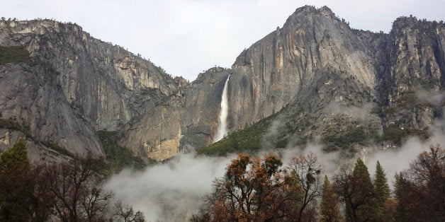 In this photo provided by the National Park Service, Upper Yosemite Falls flows at full force after two days of significant r