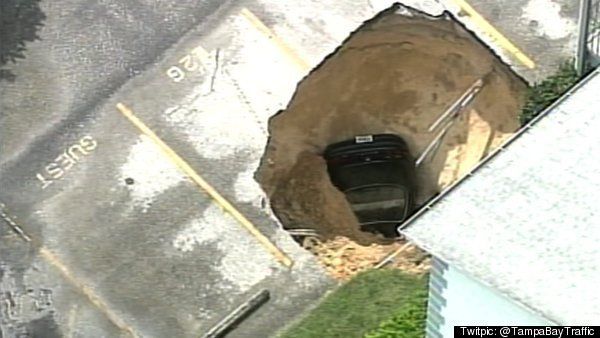Tampa Sinkhole Swallows Car Forces Evacuation Photo Video